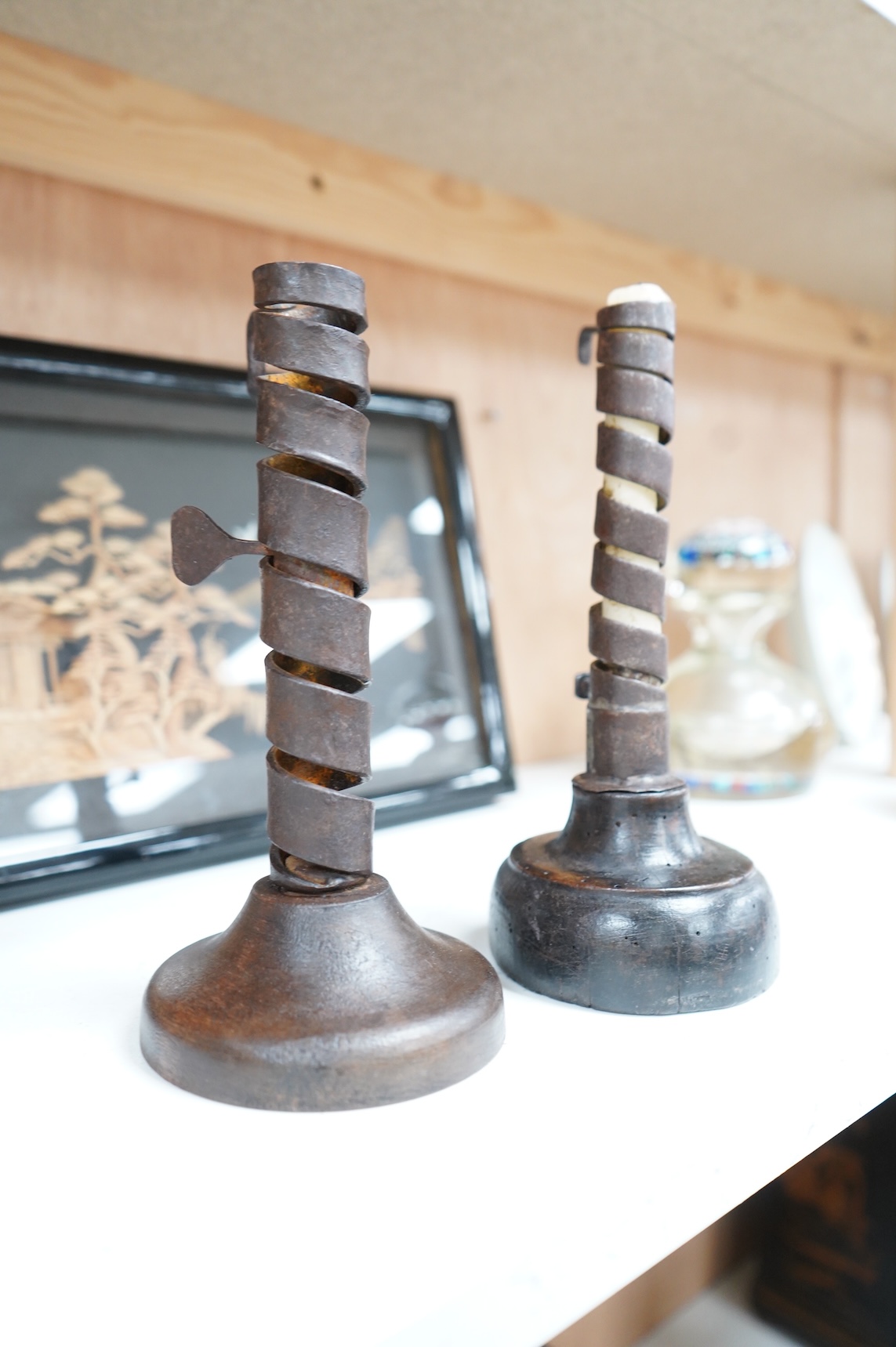 Two 18th/19th century rat de cave candlesticks, 21cm high